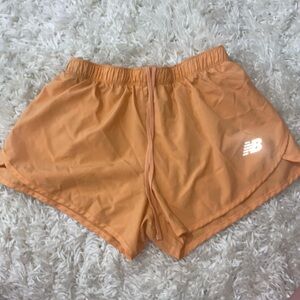 Size Small, peachy orange, New Balance shorts